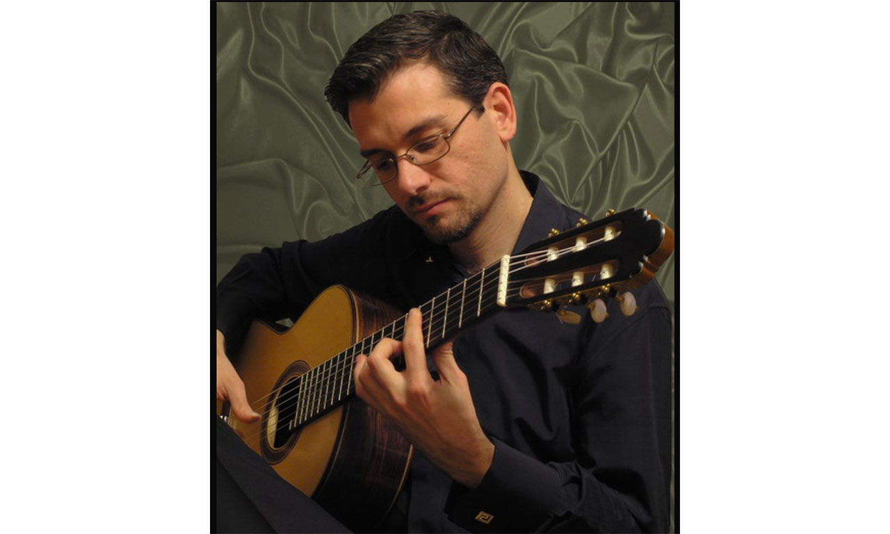 Photo of Dimitris Kotronakis with guitar