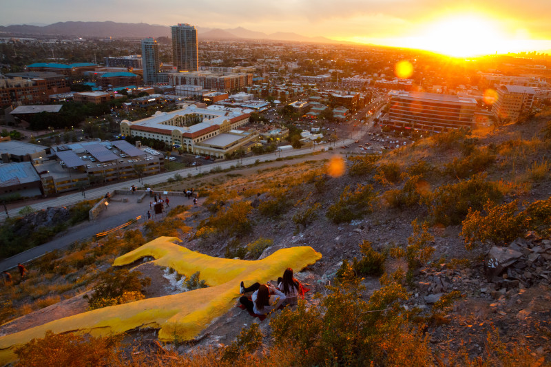 A view of the concrete A, on the side of Hayden Butte, with a view of downtown Tempe.