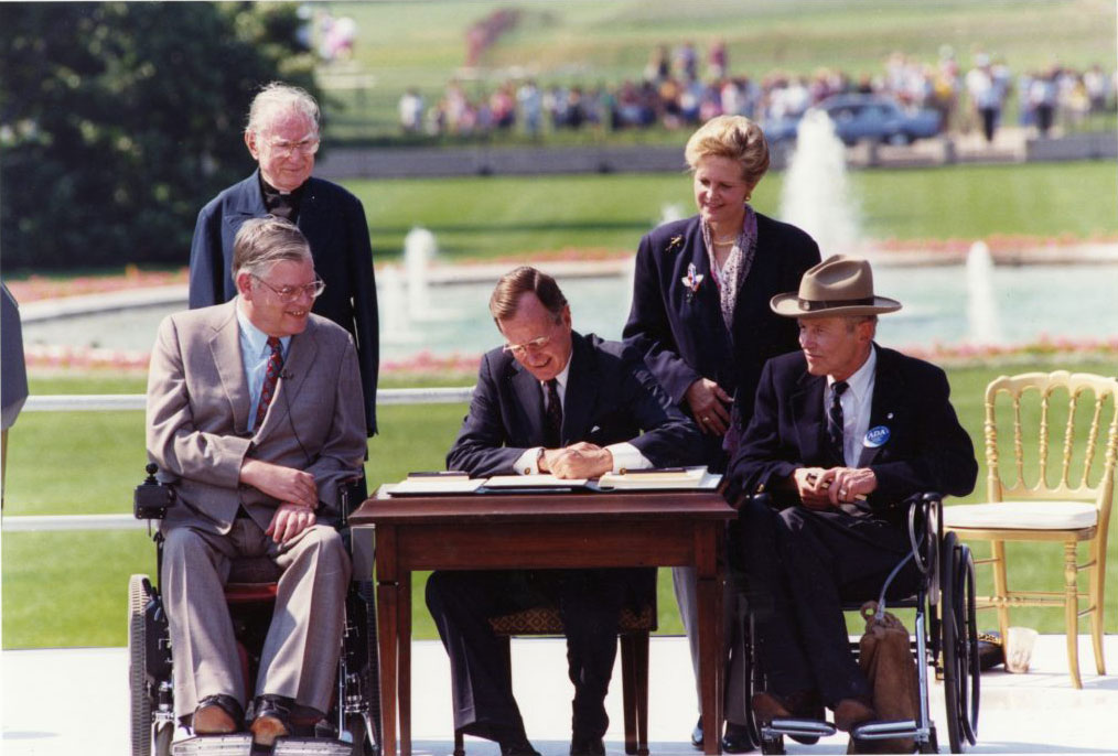 President George Bush signed the Americans with Disabilities Act (ADA) on the South Lawn of the White House.