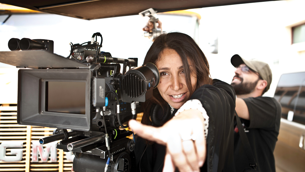 Woman filming movie