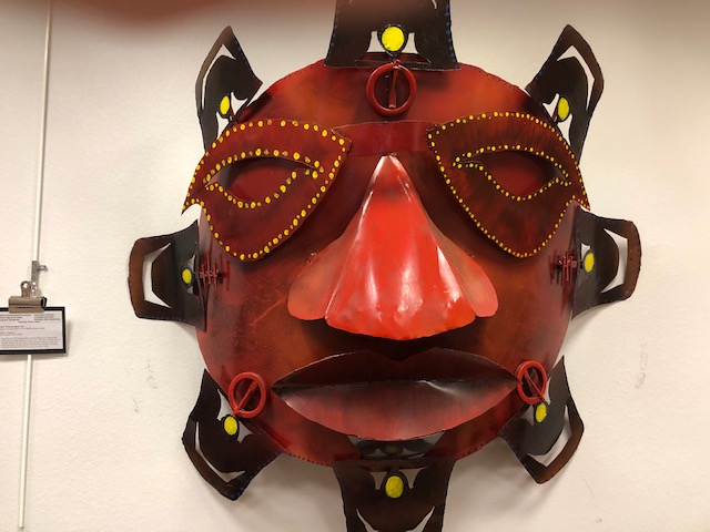 mask made by art student on exhibit in Fletcher Library