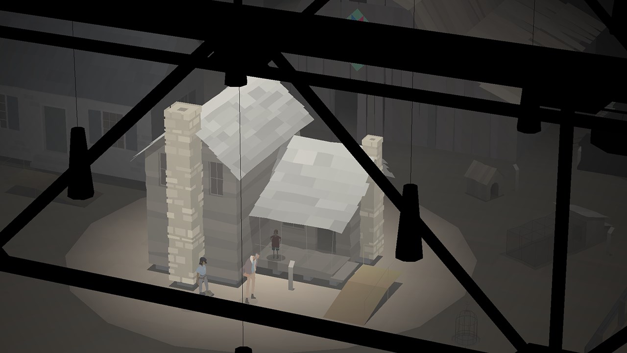 A screenshot from the video game Kentucky Route Zero, showing a cabin, viewed from above, under a floodlight in what looks to be a museum or gallery space. In the foreground, we can see shadowy beams holding up lighting.