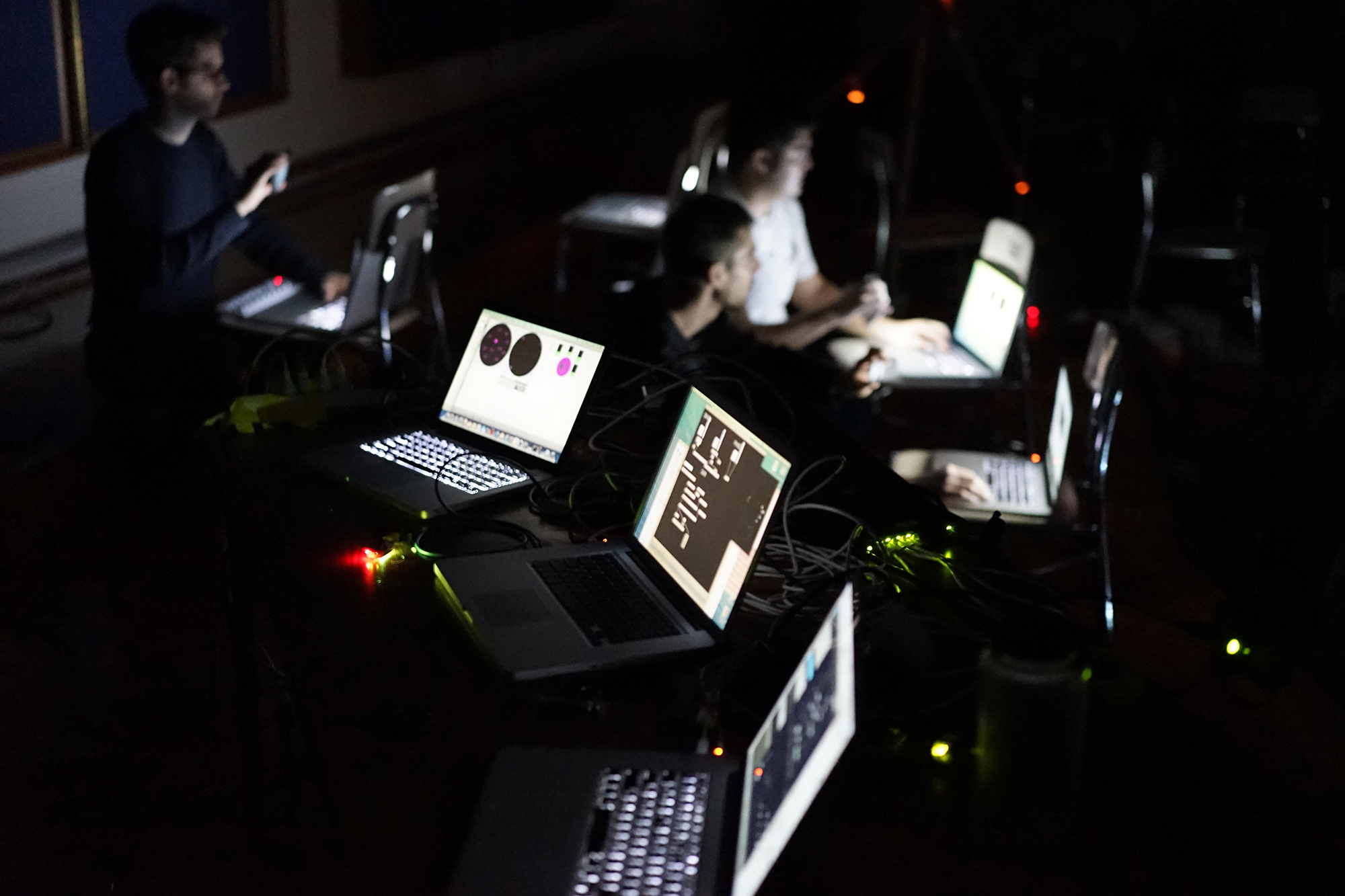 laptops arranged like an orchestra