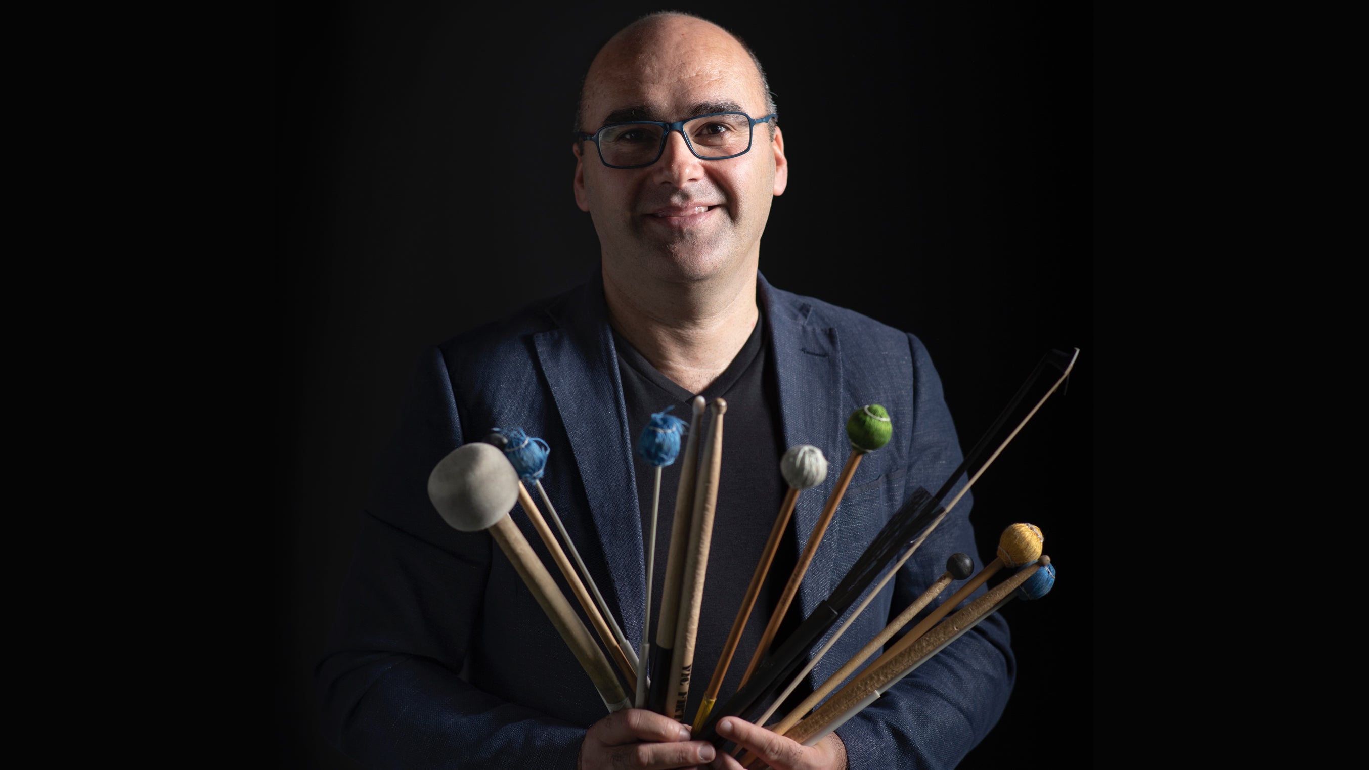 Photo of Simone Mancuso with drum sticks