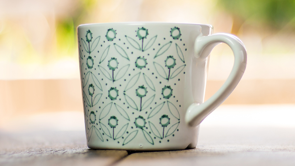 Coffee cup with blue flowers 