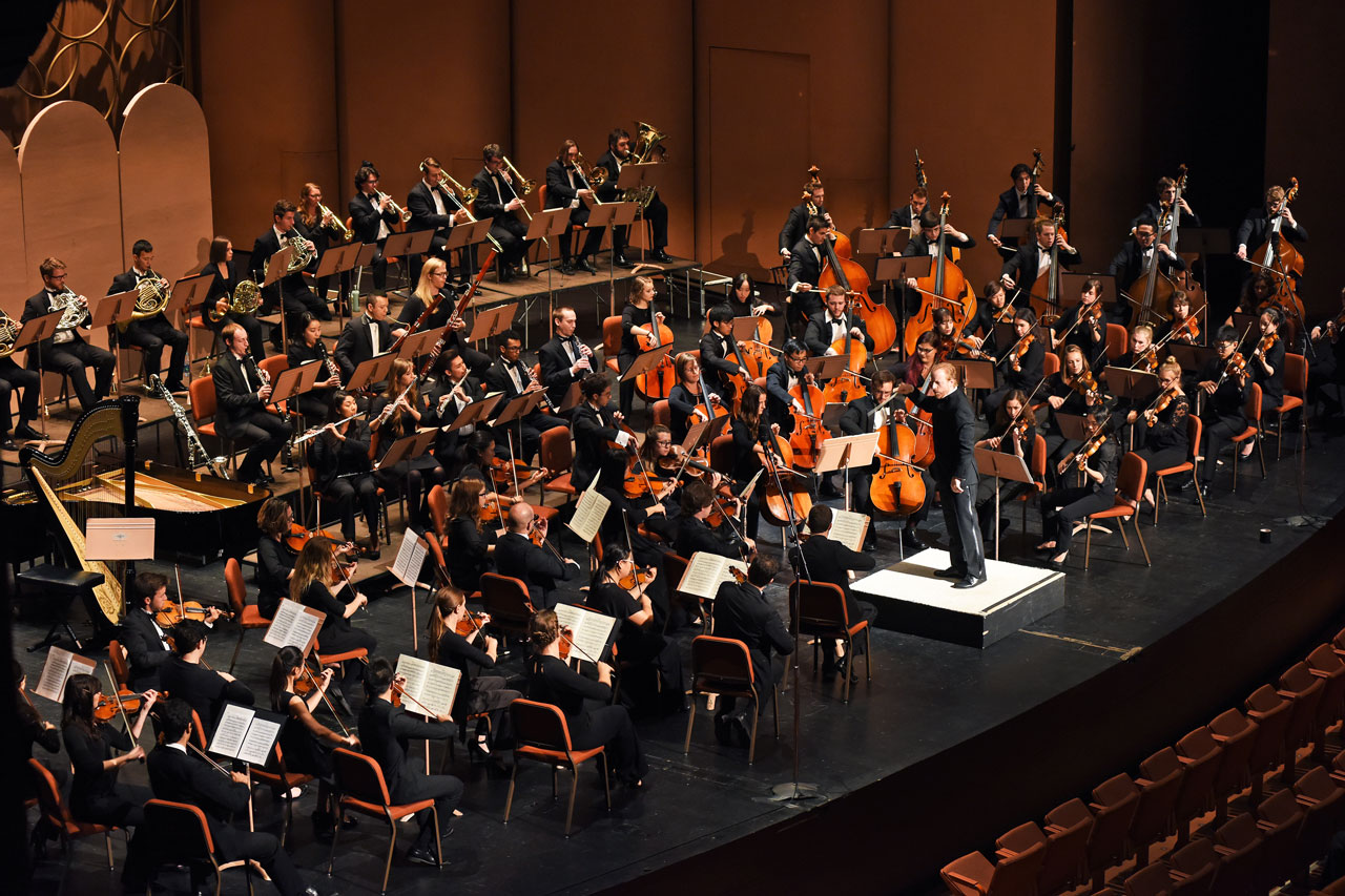 Photo of Jeffery Meyer conducting the ASU Symphony Orchestra