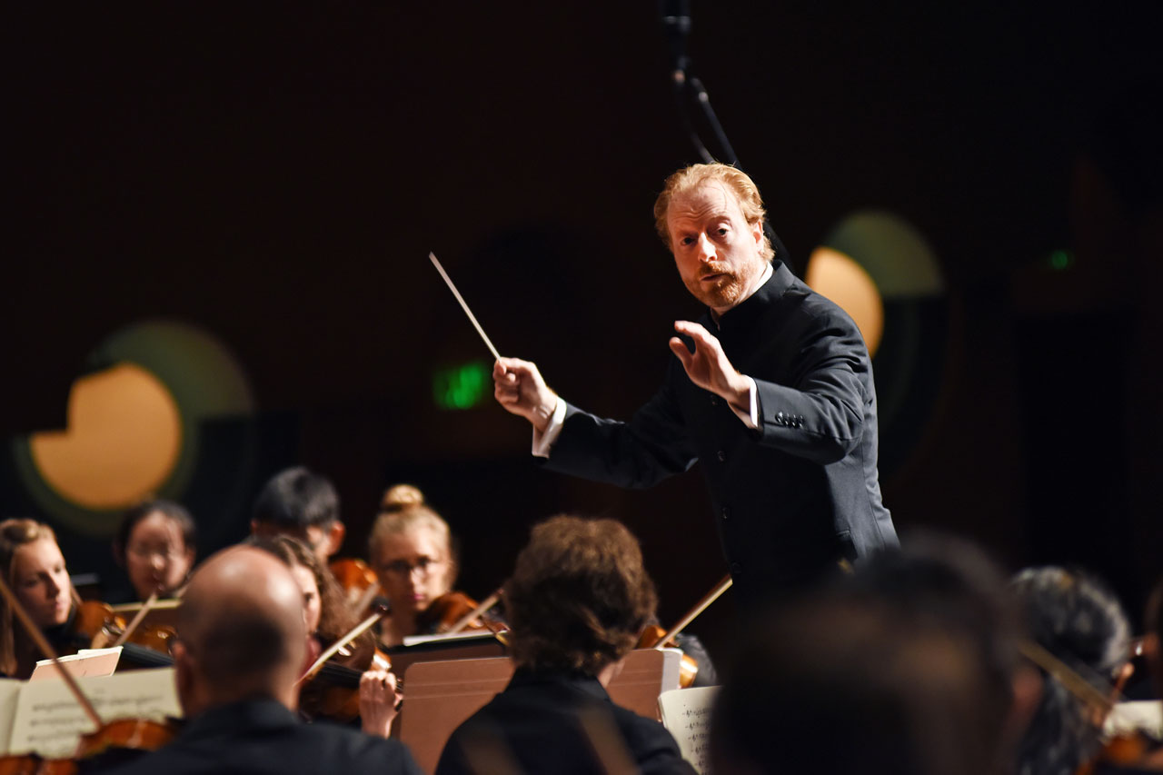 Photo of Jeffery Meyer conducting the ASU Symphony Orchestra