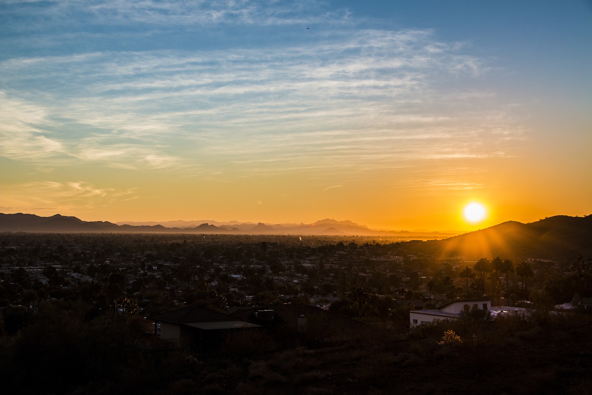 photo of sun over Phoenix AZ