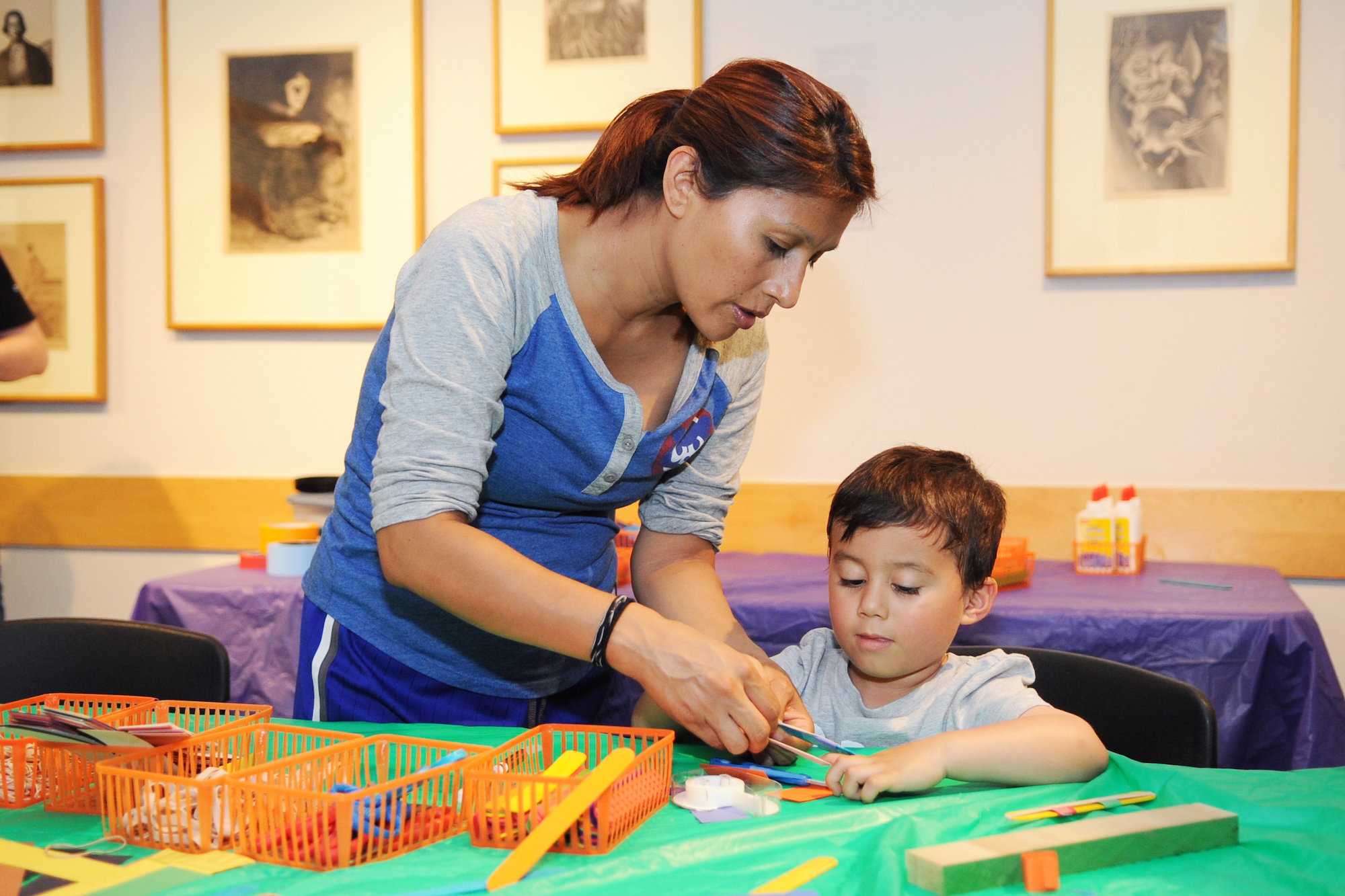 A mother and her child create art at First Saturday for Families at the ASU Art Museum