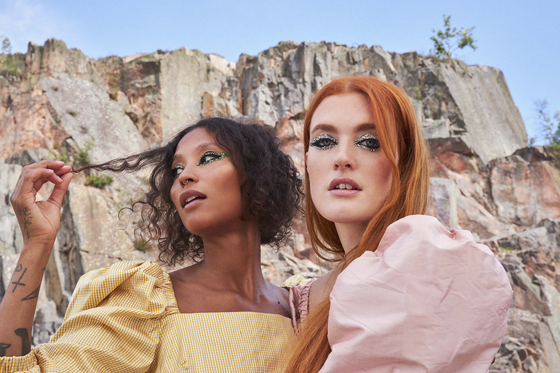 two women who make up Icona Pop pose for close up portrait photo