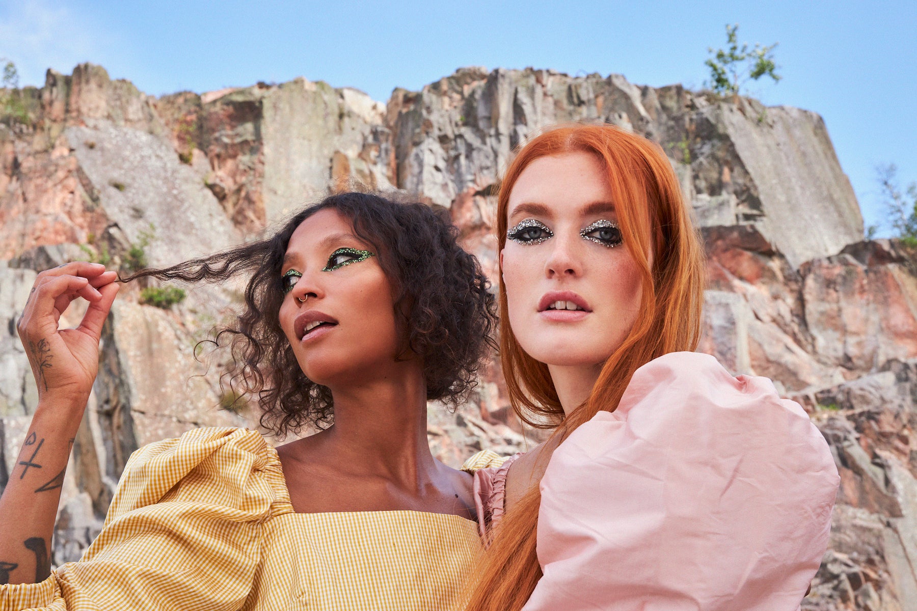 two women who make up Icona Pop pose for close up portrait photo