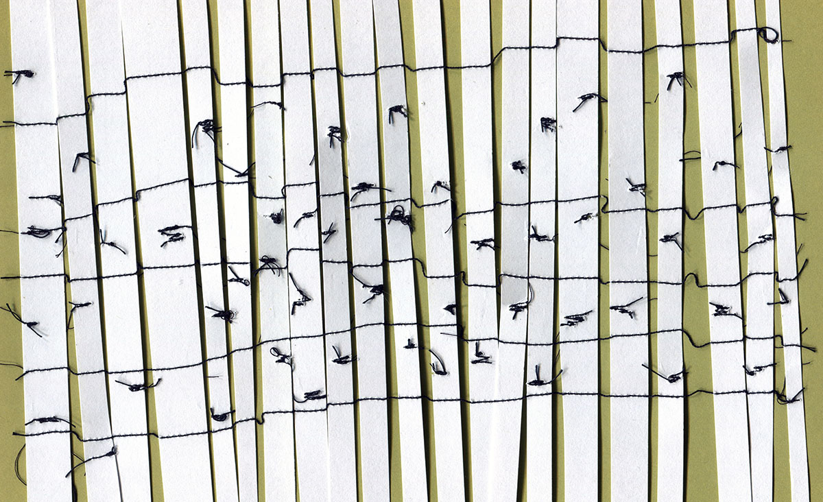 A stylized image of a grove of birch trees, created using strips of white paper and black string.