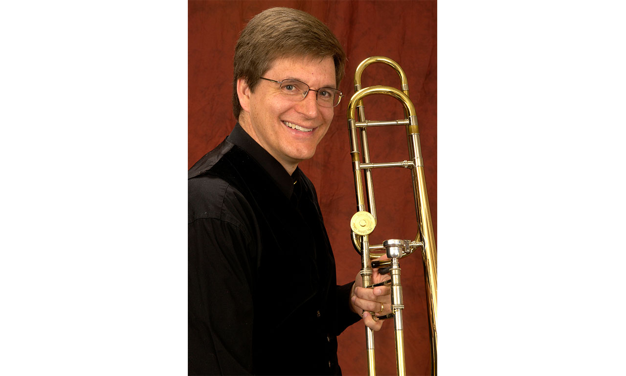Photo of Brad Edwards with trombone