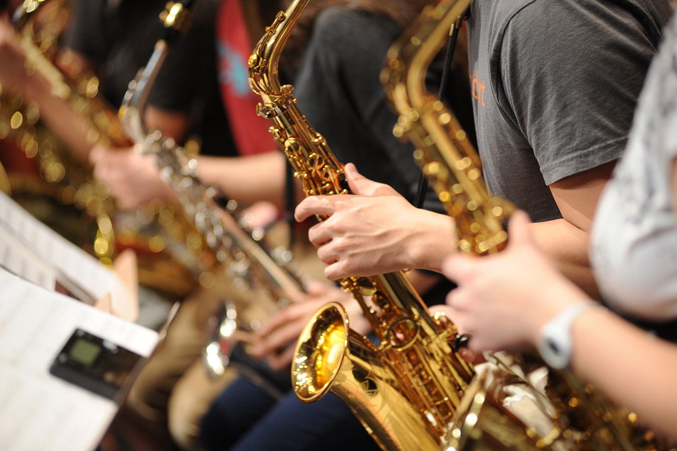 Students with Saxophones photo of saxophone players
