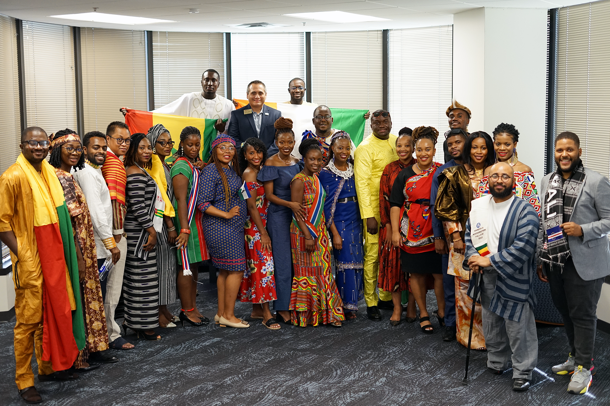 Group photo of the 2022 Mandela Washington Fellowship cohort at ASU wearing clothing representative of their home nations. 