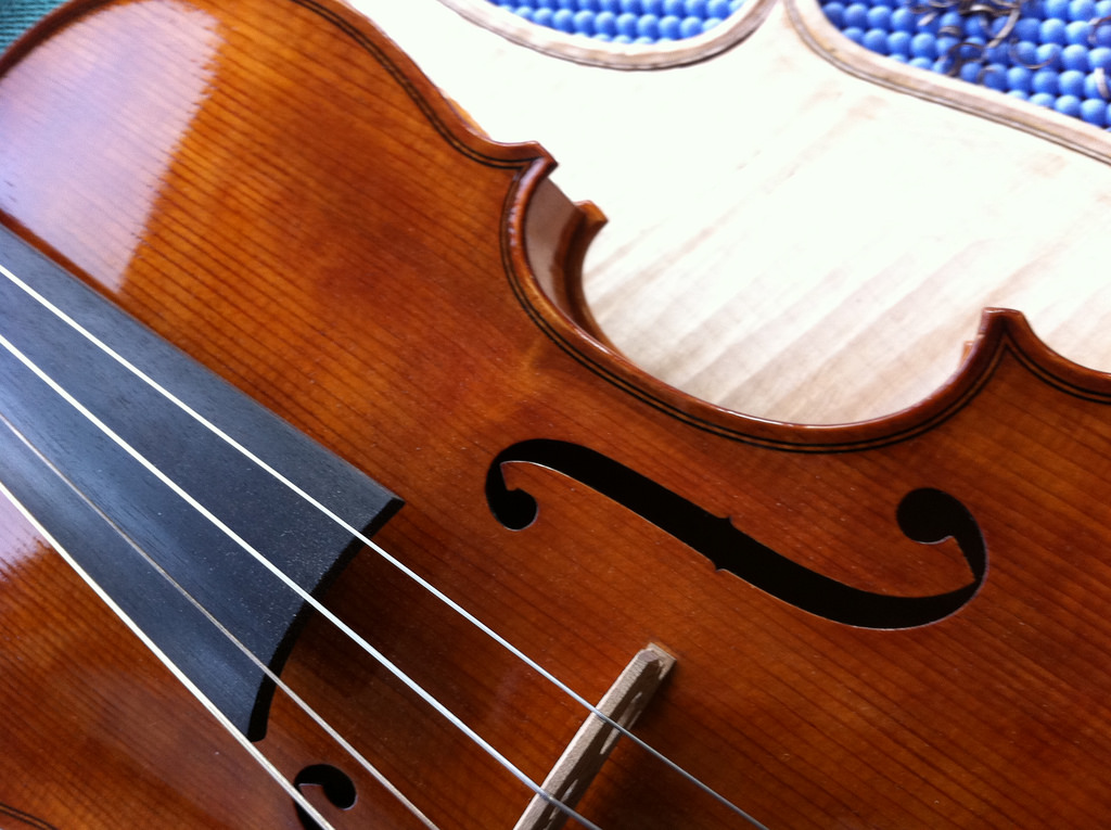 Close-up photo of a viola and bow