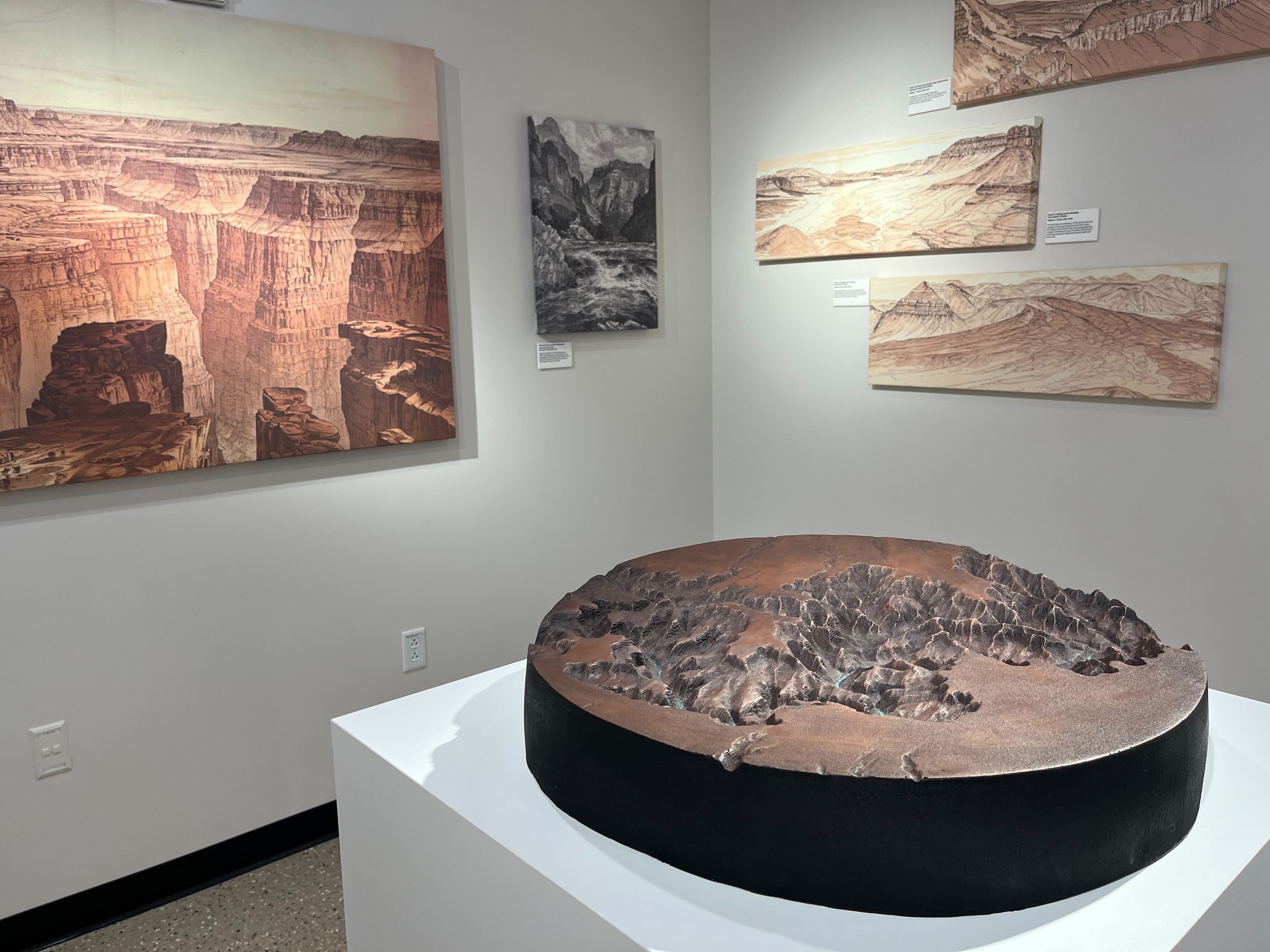 Photographs and objects on display of the Grand Canyon