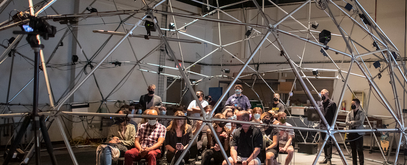 Patrons inside geodesic dome listening to ambisonic compositions